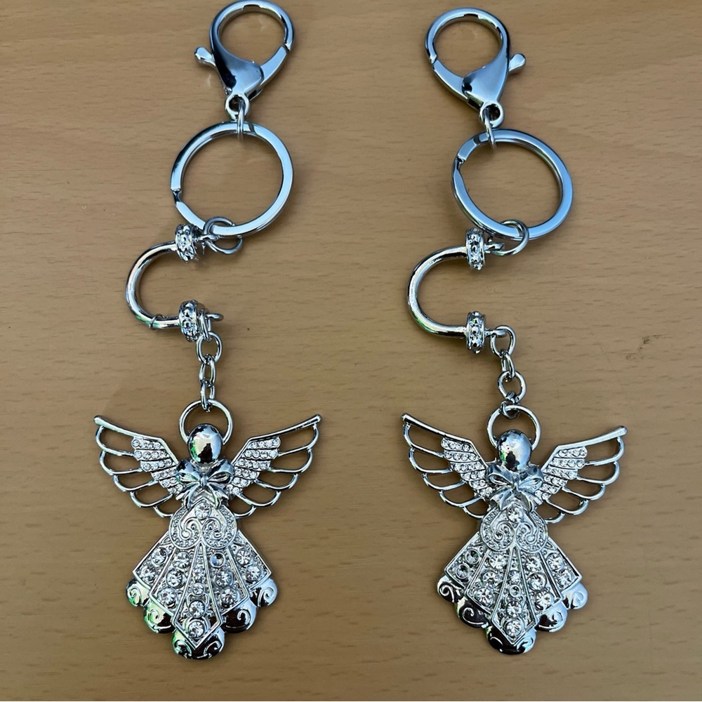 Nwt Angelitos keychain set 4 pieces silver color